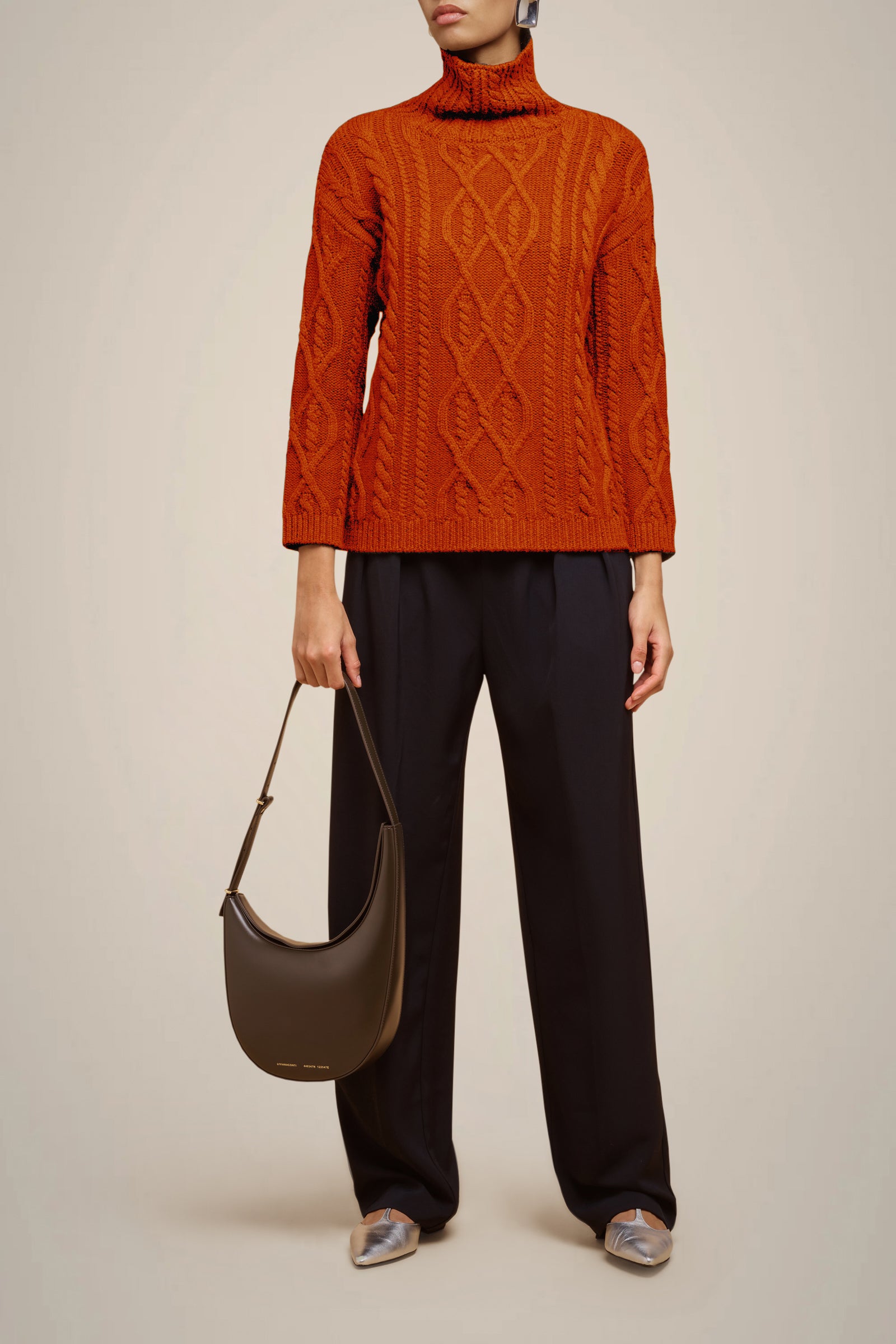 CABLE-KNIT SWEATER