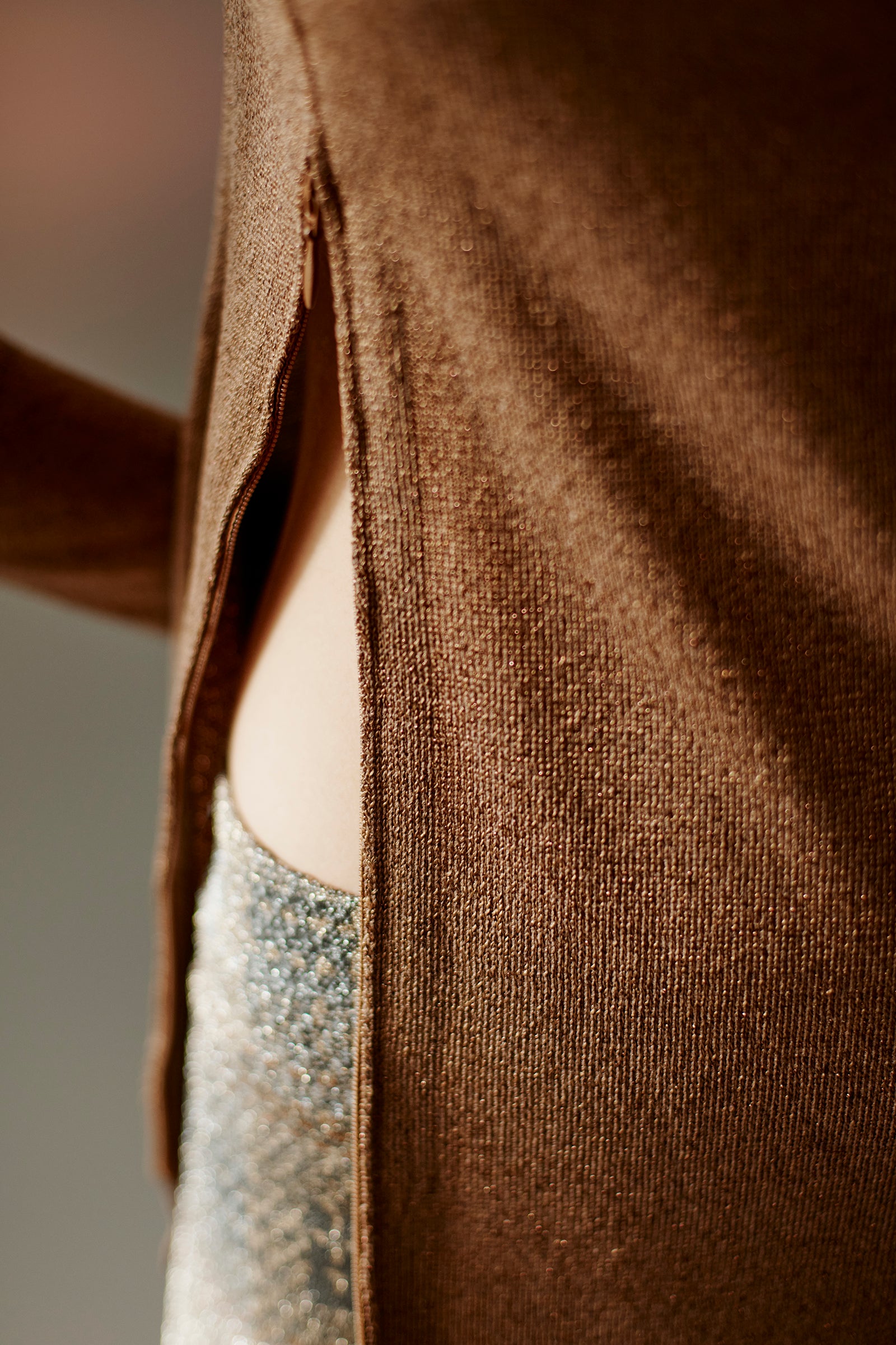 DOLCEVITA IN LUREX CON ZIP DA SPALLA A FIANCO