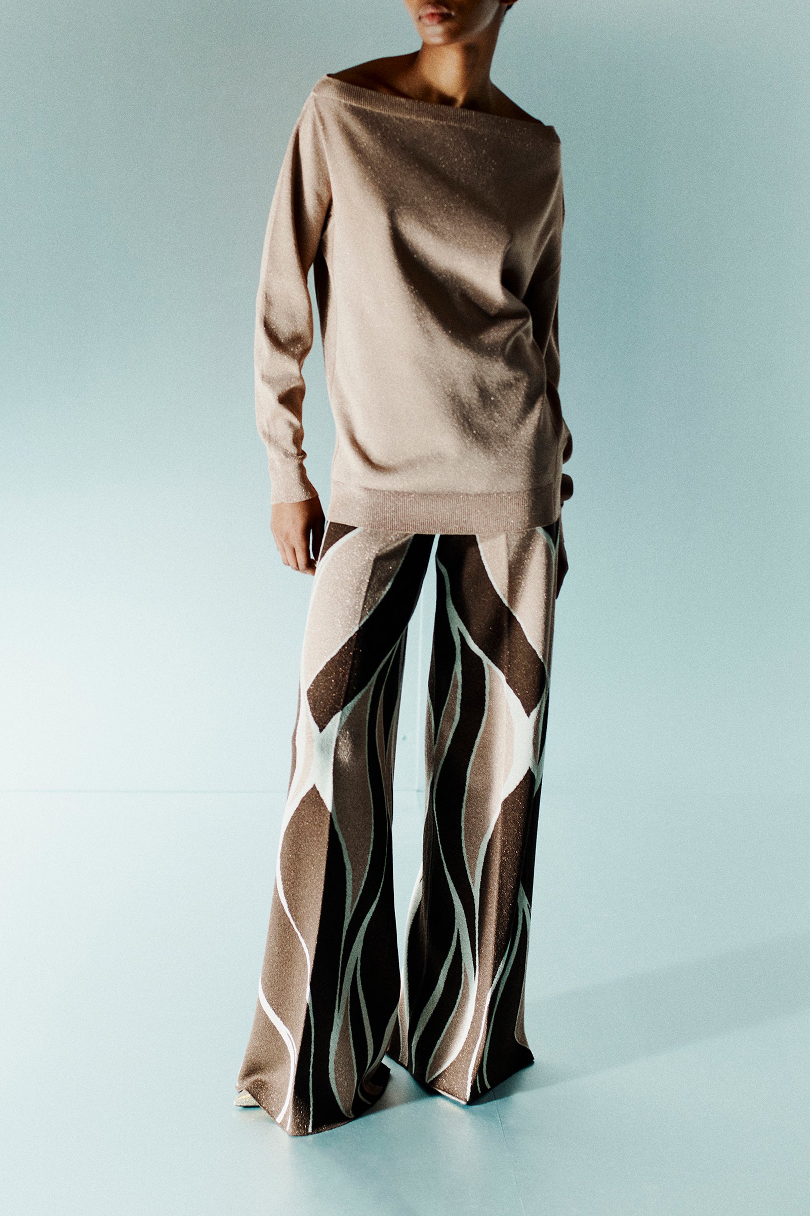 MAGLIA CON SPALLA SCOPERTA IN LUREX