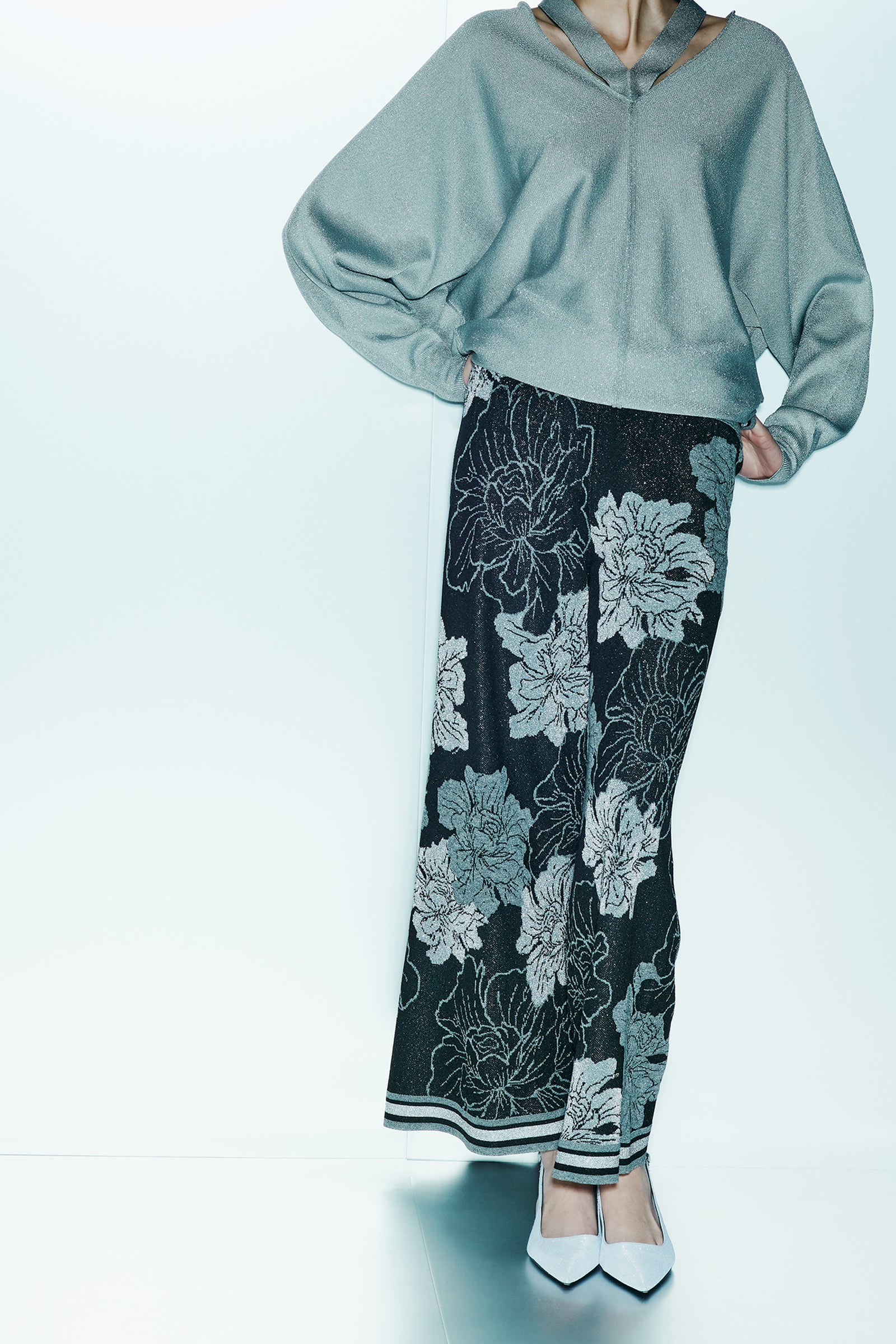 MAGLIA CON DETTAGLI CUT OUT IN LUREX