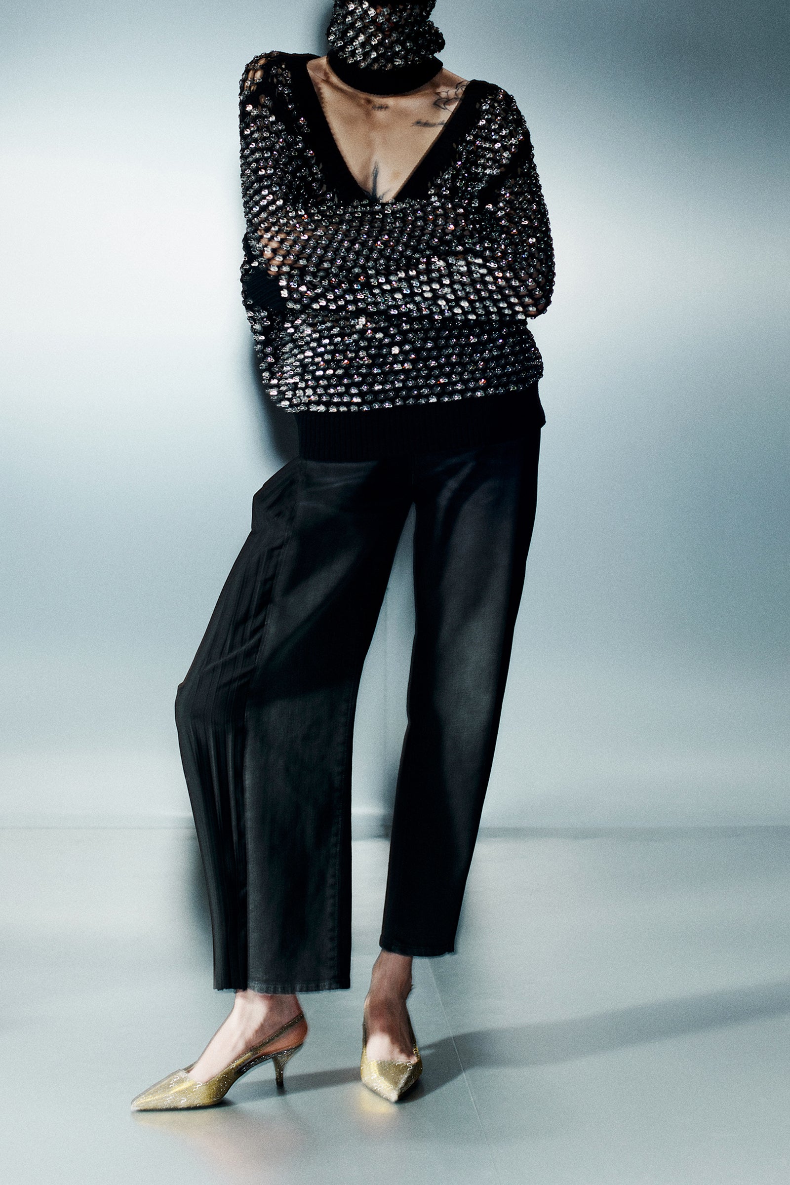 MAGLIA SCOLLO A V A RETE CON STRASS GIOIELLO
