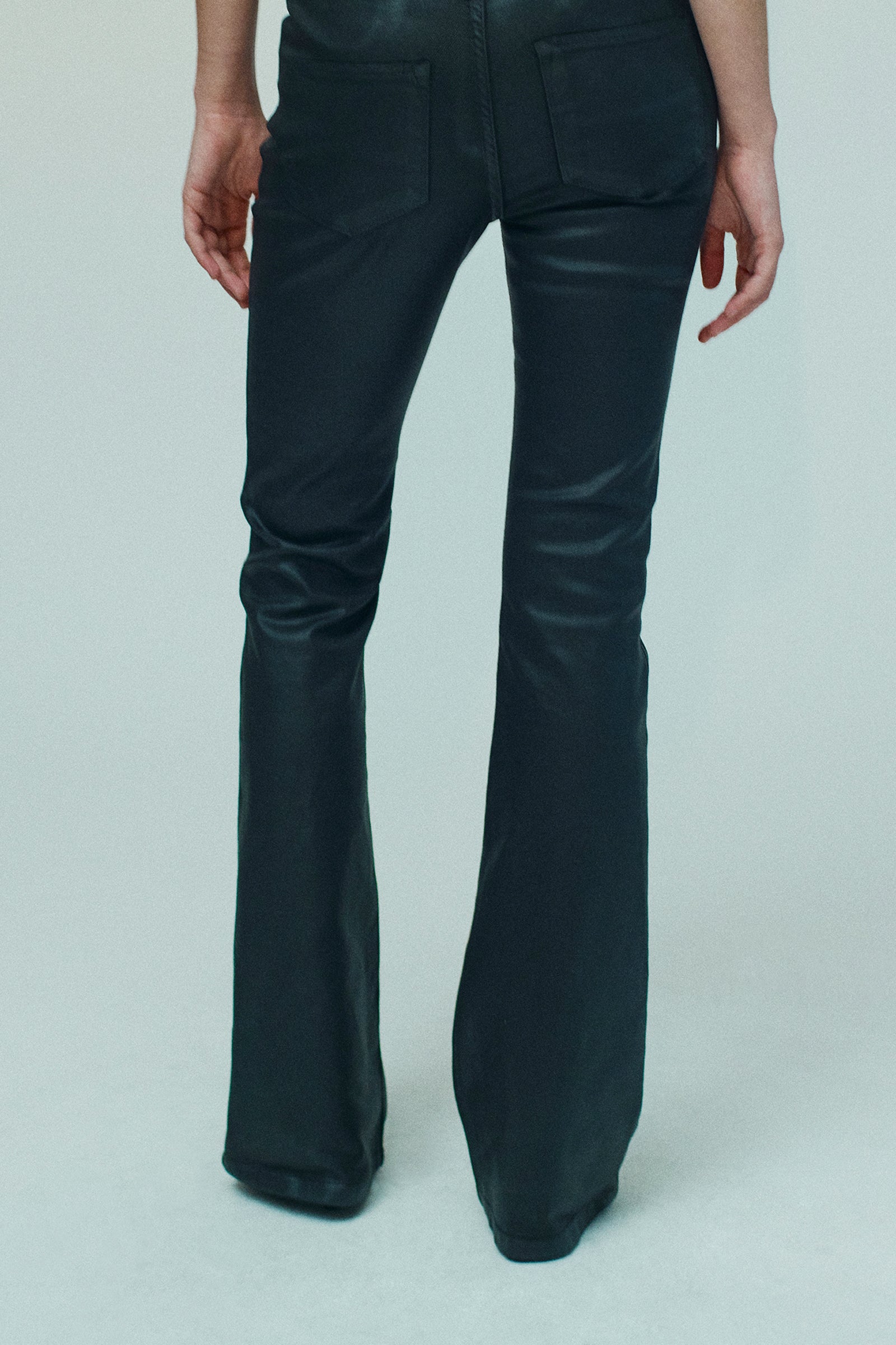 DENIM ELASTICIZZATO CON SPALMATURA