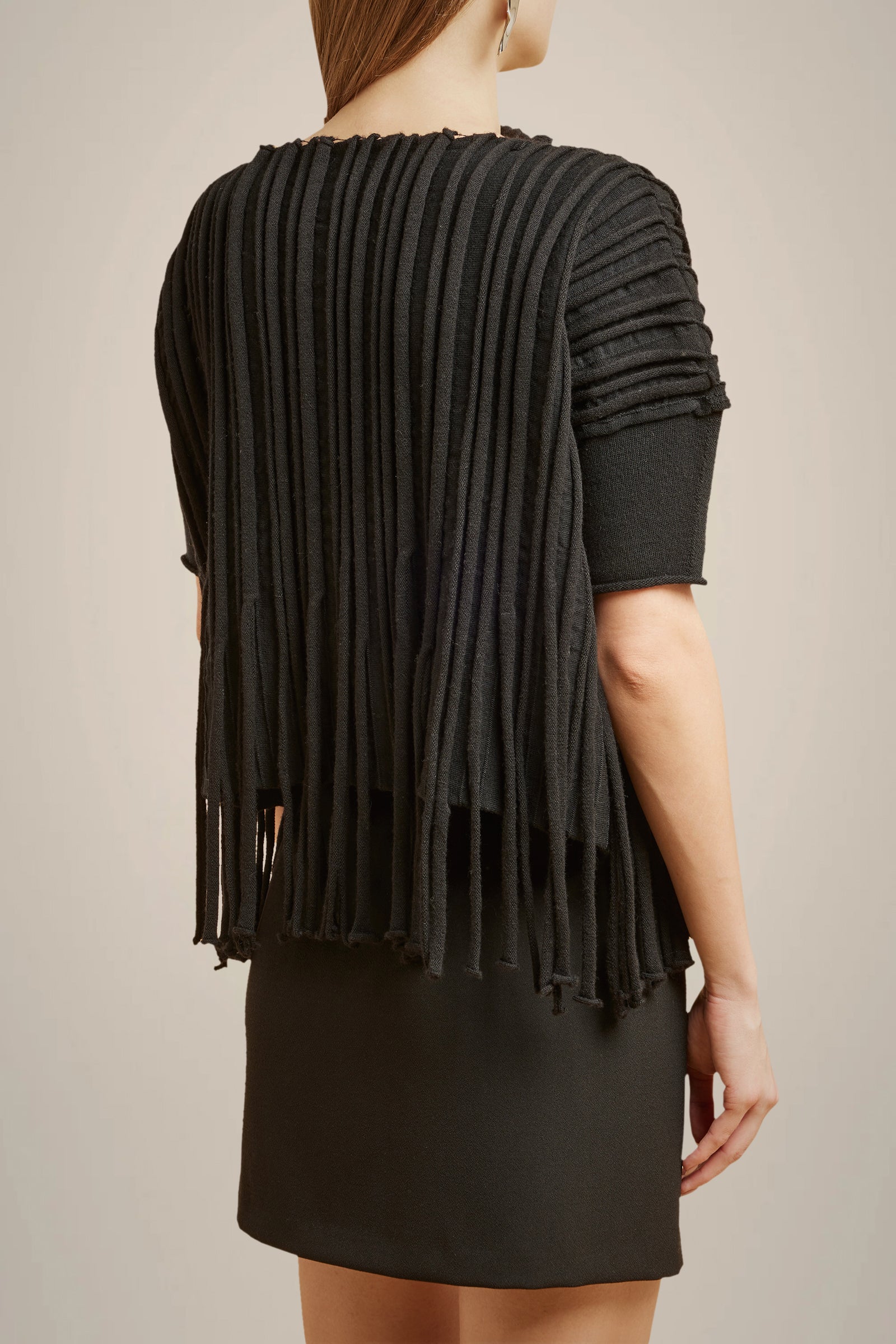 MAGLIA CON FRANGE