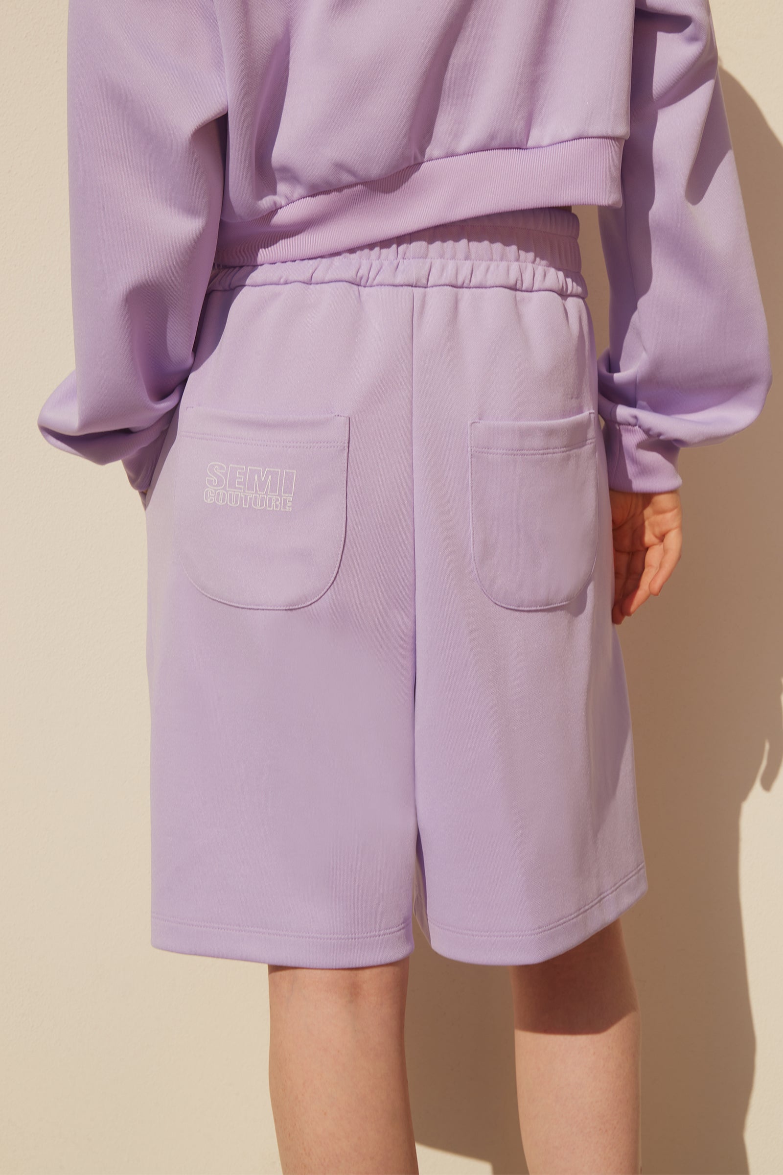 TECHNICAL FLEECE SHORTS