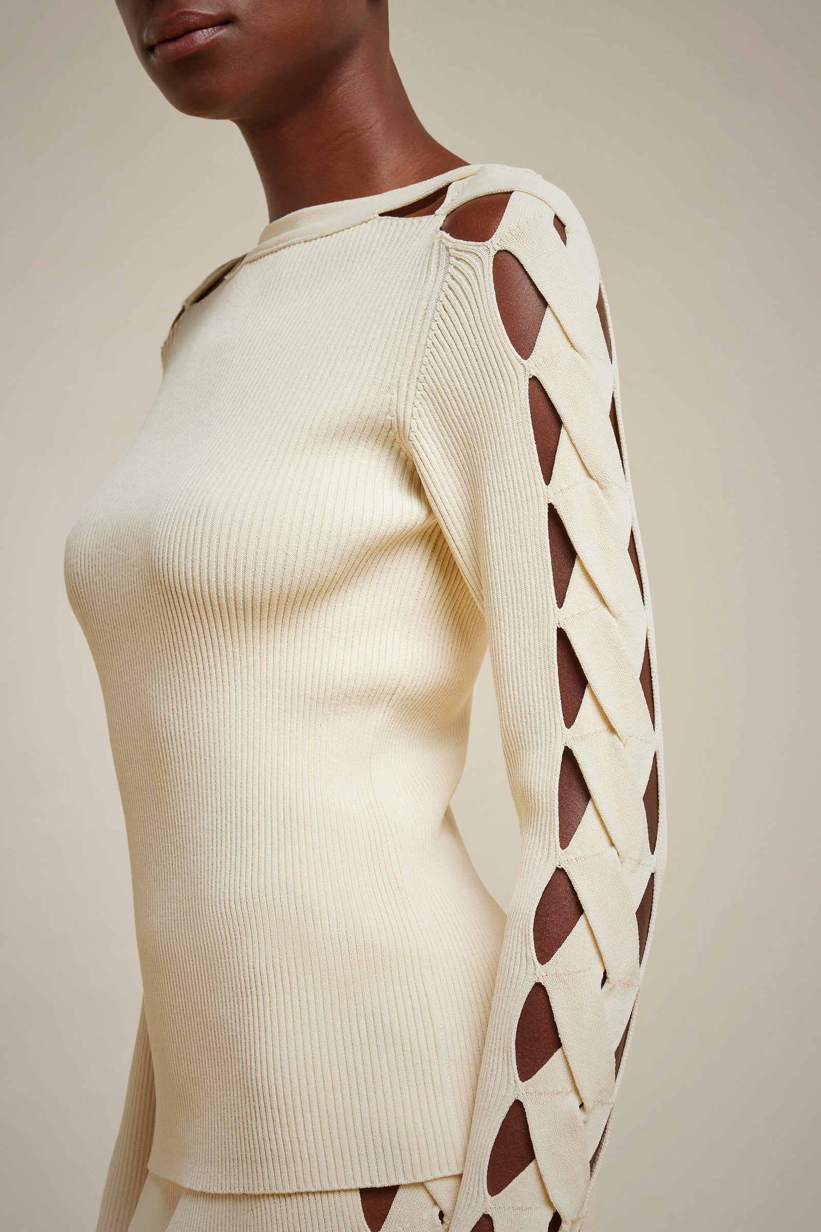 MAGLIA MANICHE CON INTRECCIO