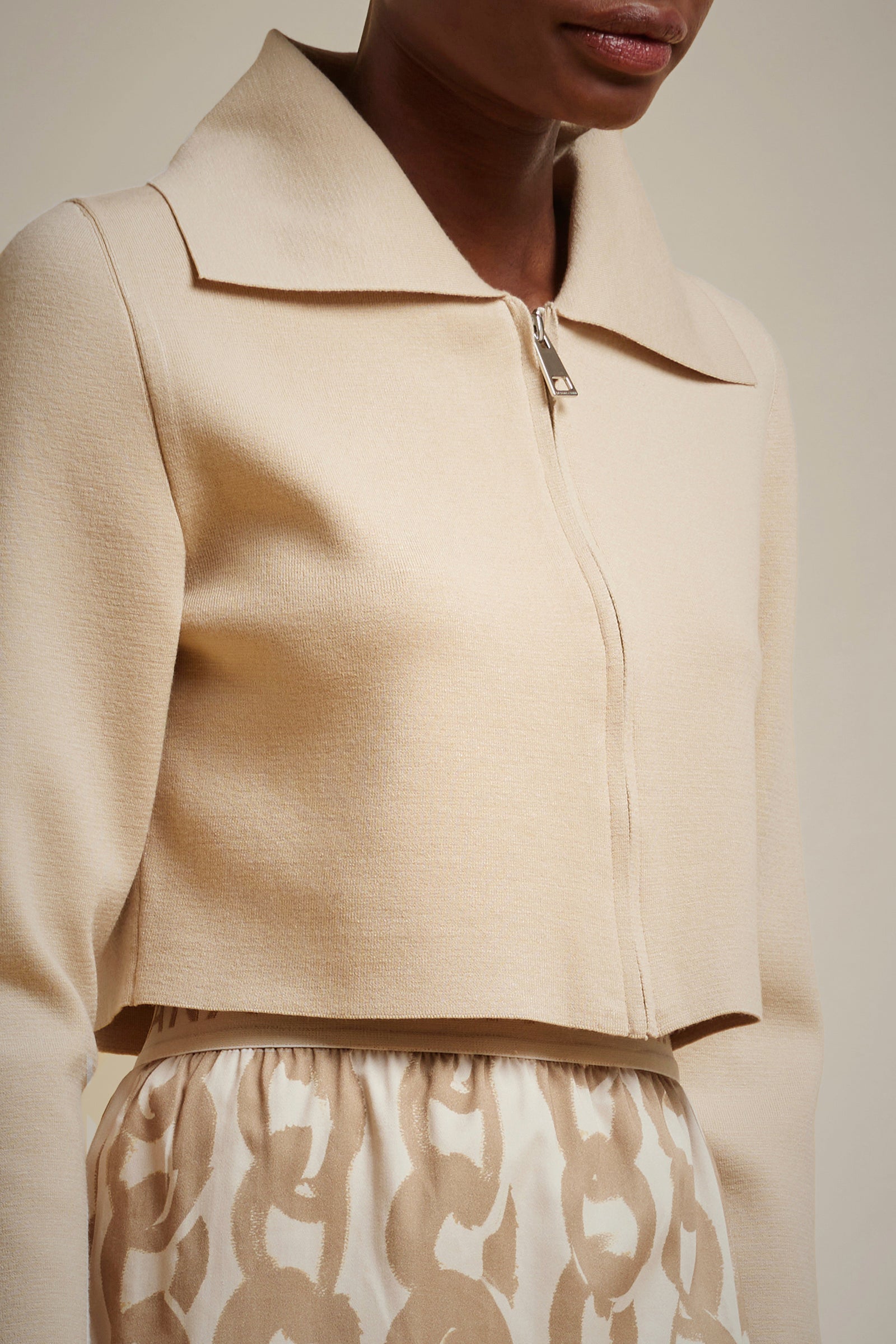 CARDIGAN CON ZIP