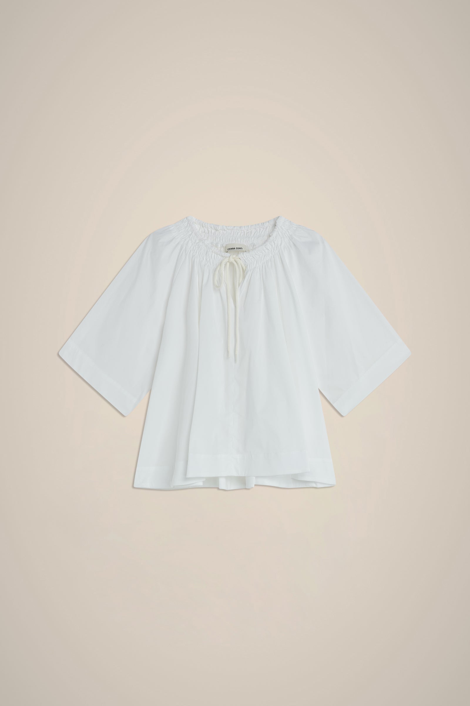 BLUSA CON FIOCCO