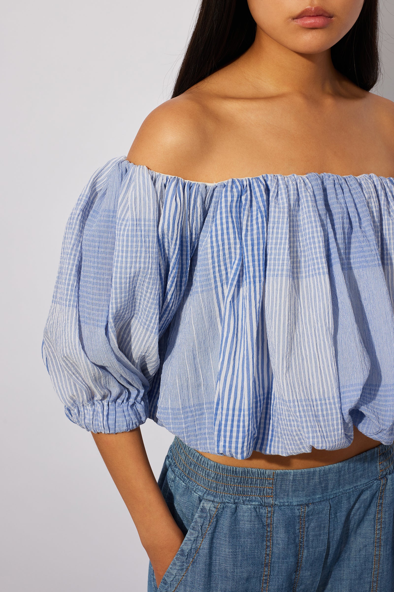 BLUSA IN MUSSOLA MILLE RIGHE