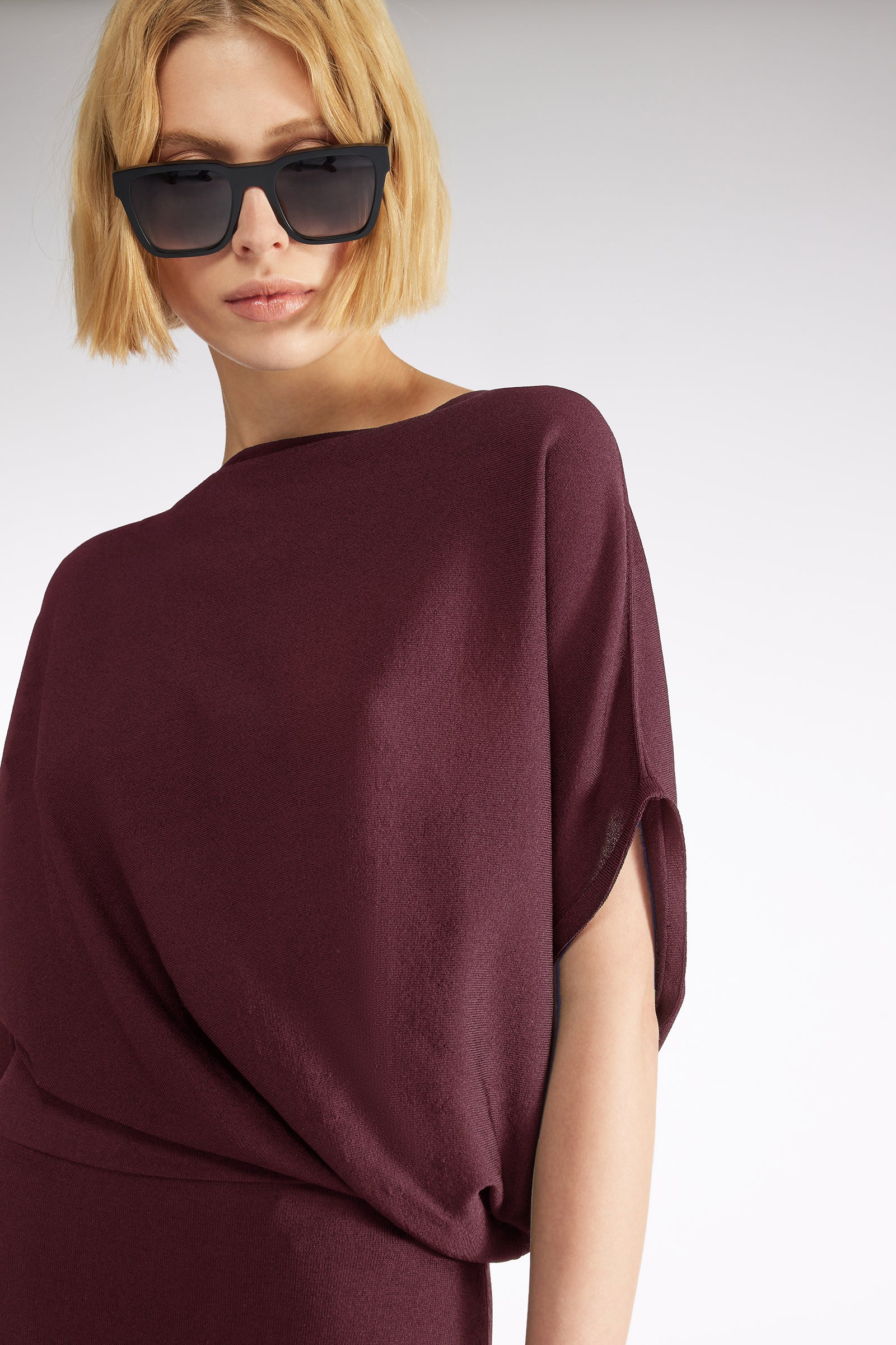 ABITO CON DRAPPEGGIO