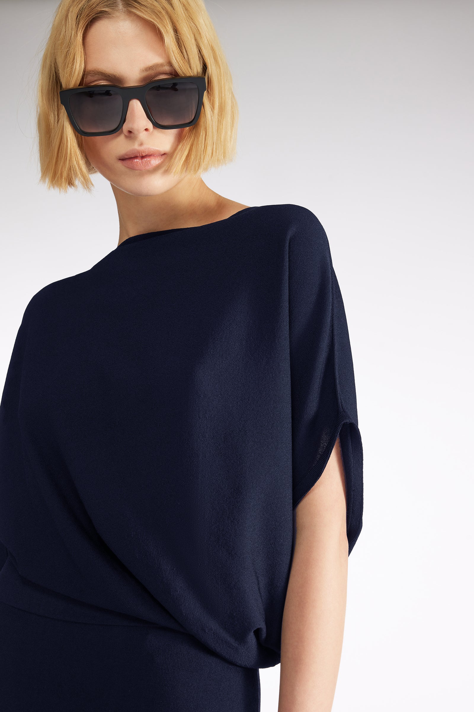 ABITO CON DRAPPEGGIO