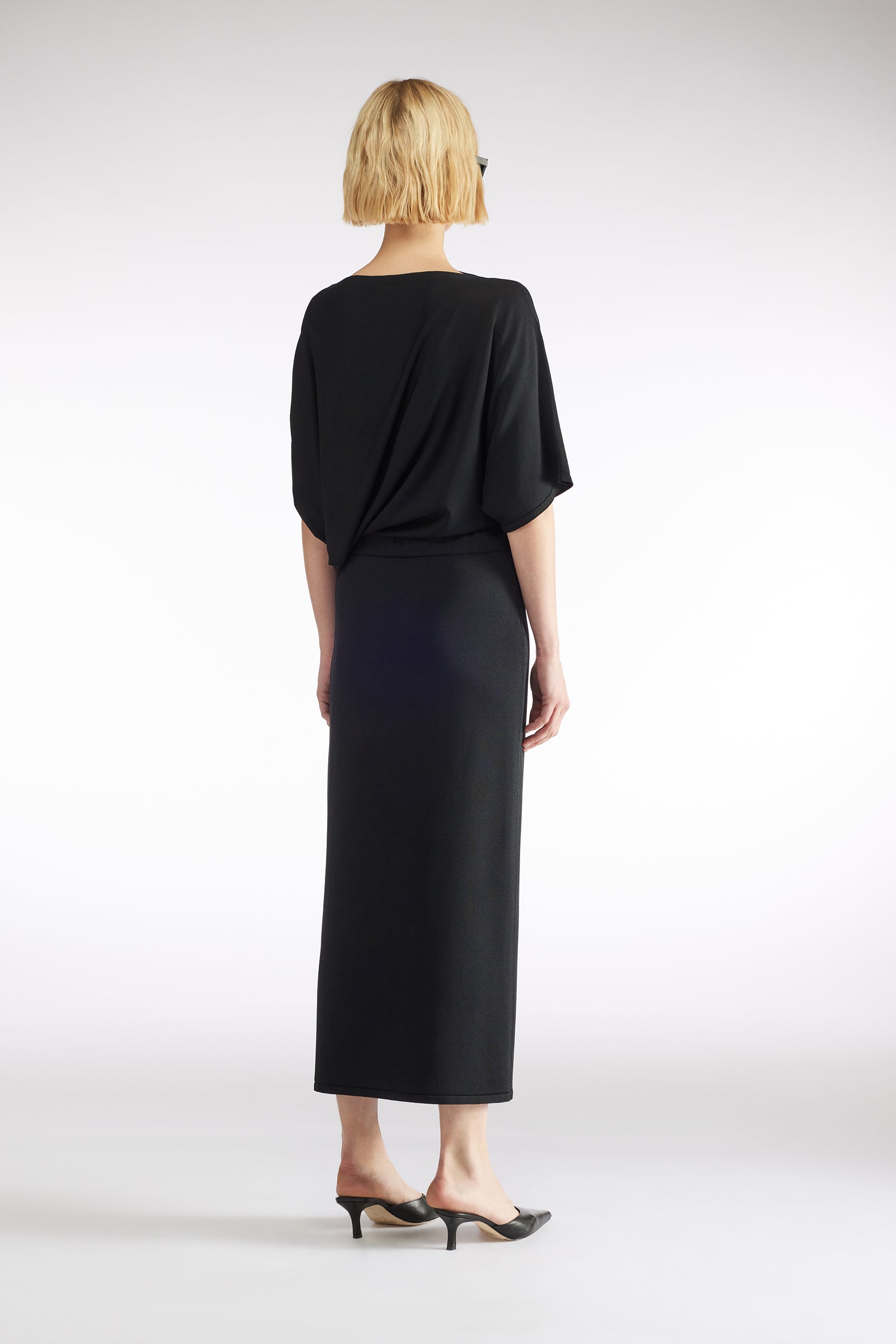 ABITO CON DRAPPEGGIO