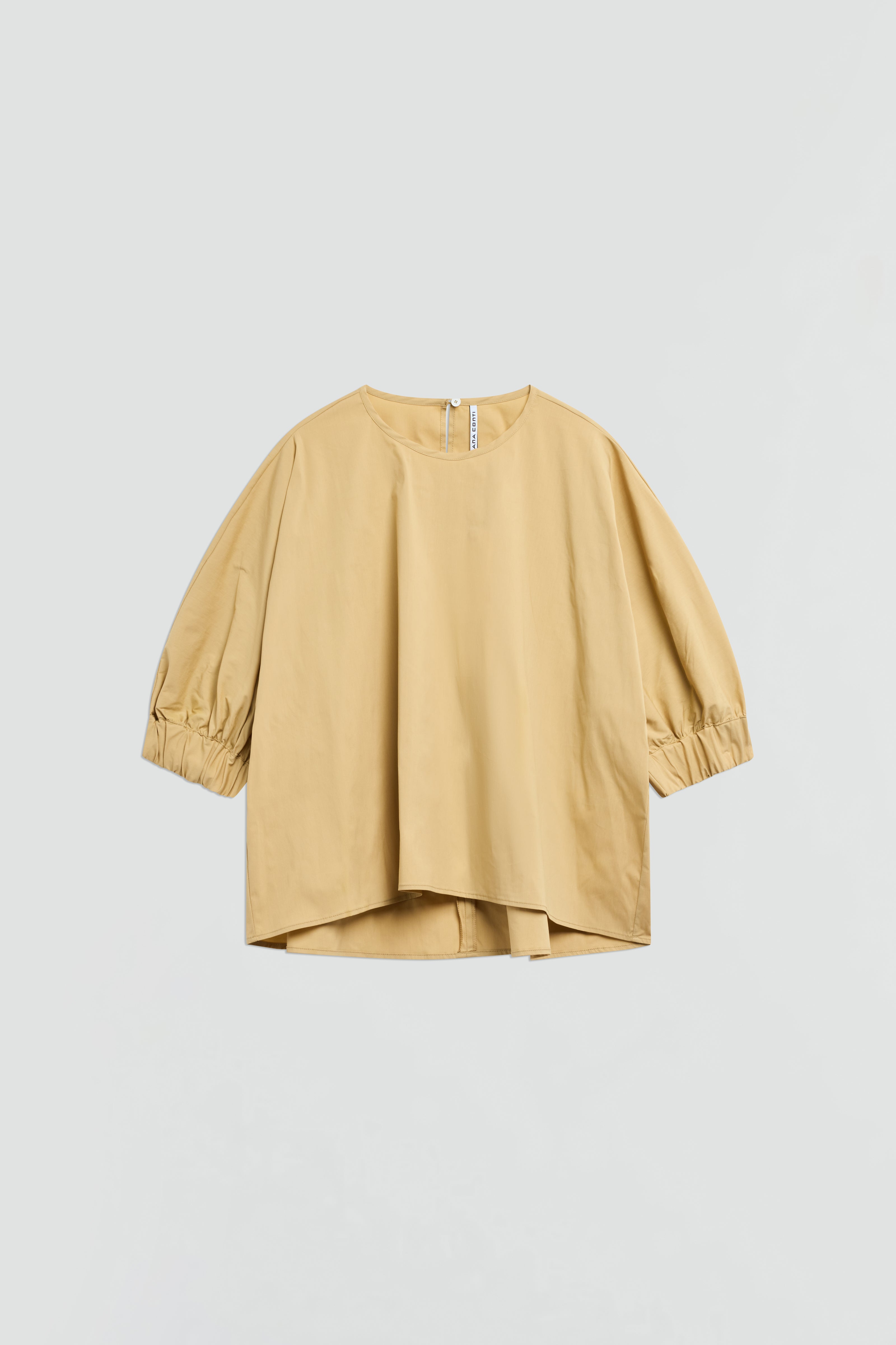 BLUSA CON POLSINI ARRICCIATI