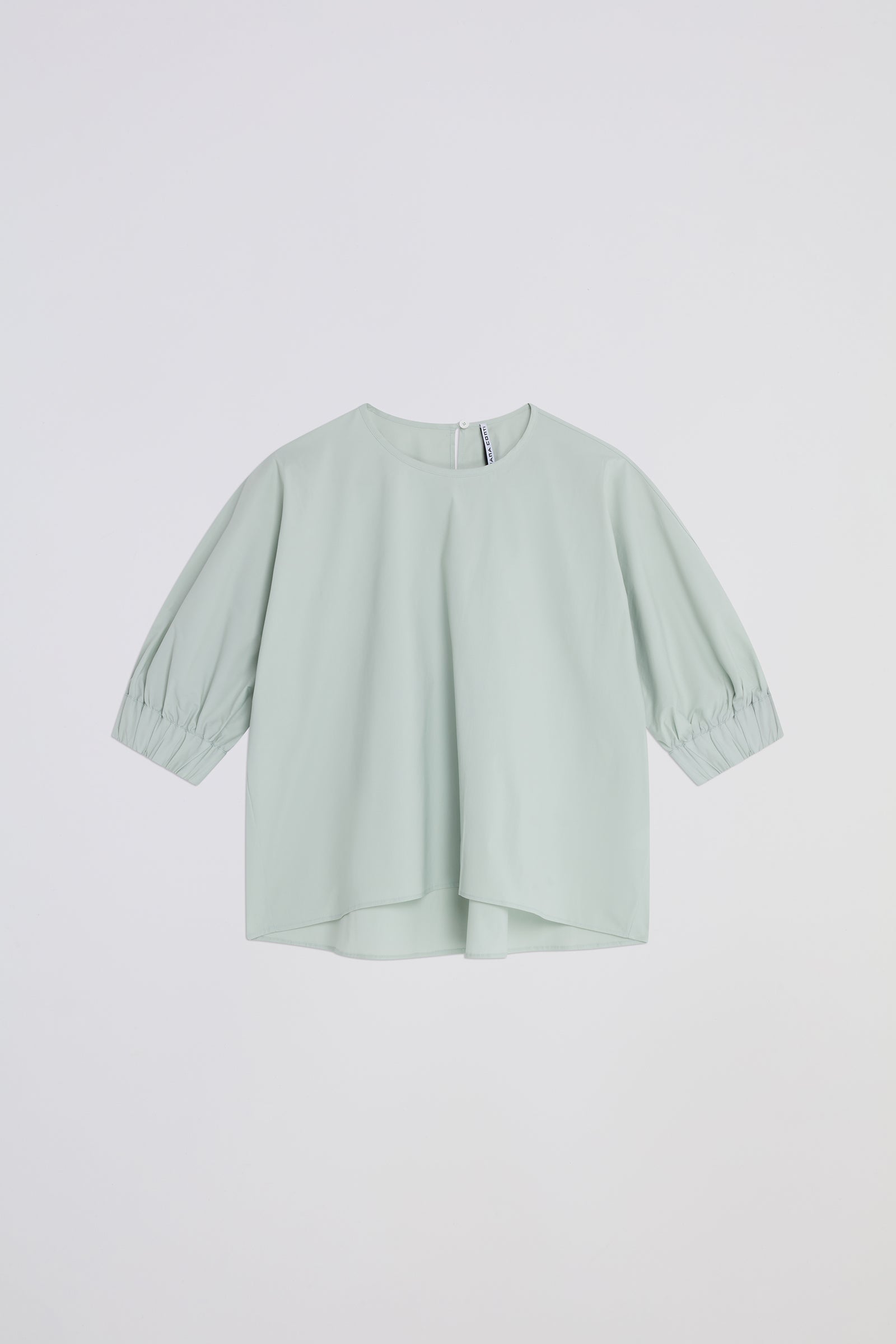 BLUSA CON POLSINI ARRICCIATI