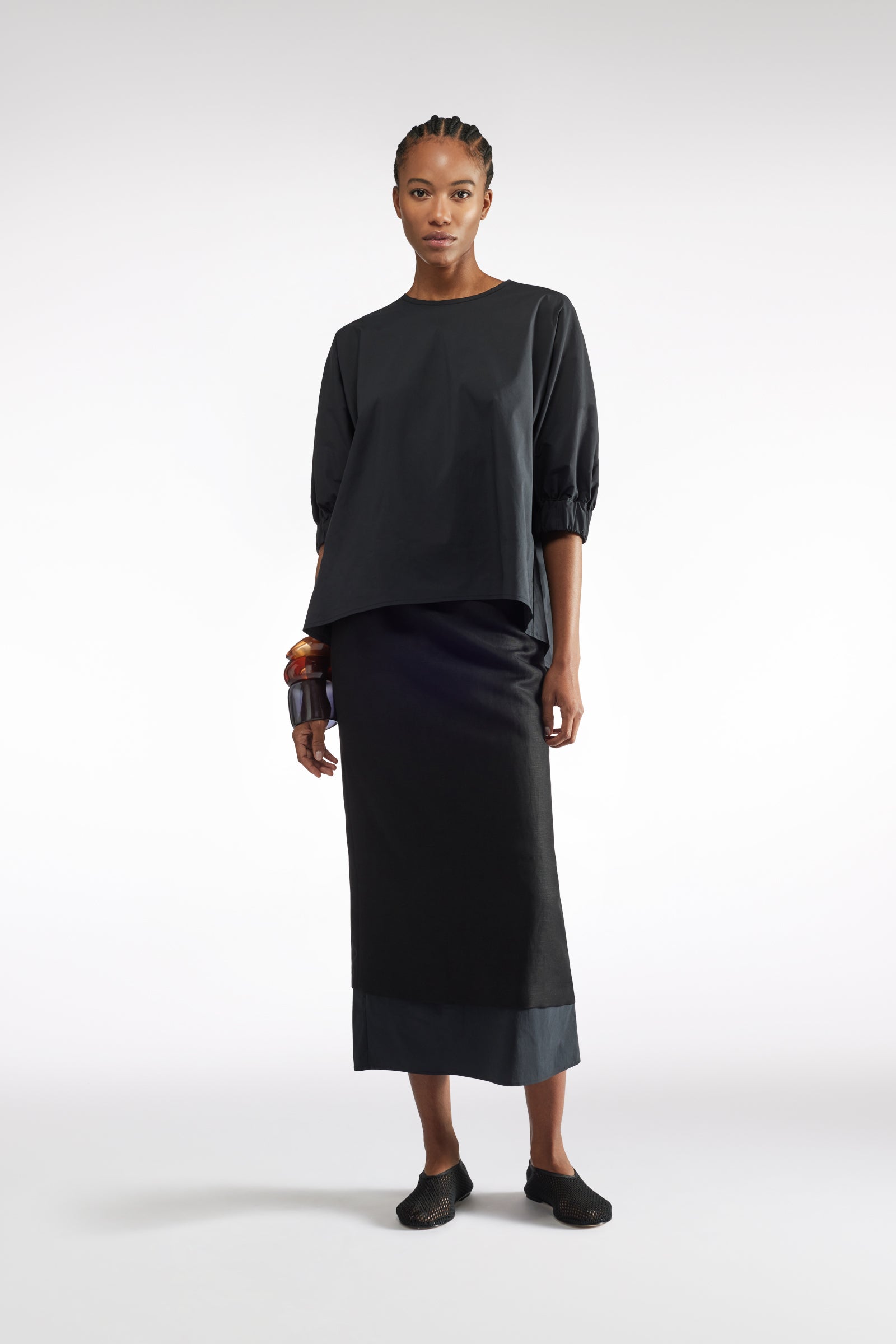 BLUSA CON POLSINI ARRICCIATI