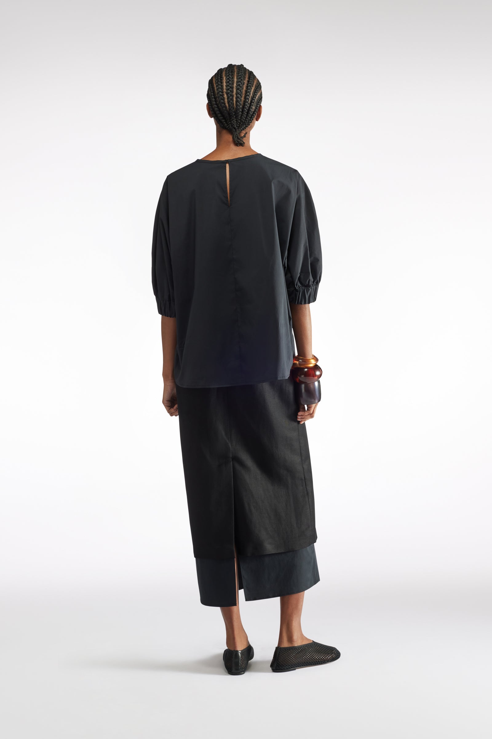 BLUSA CON POLSINI ARRICCIATI