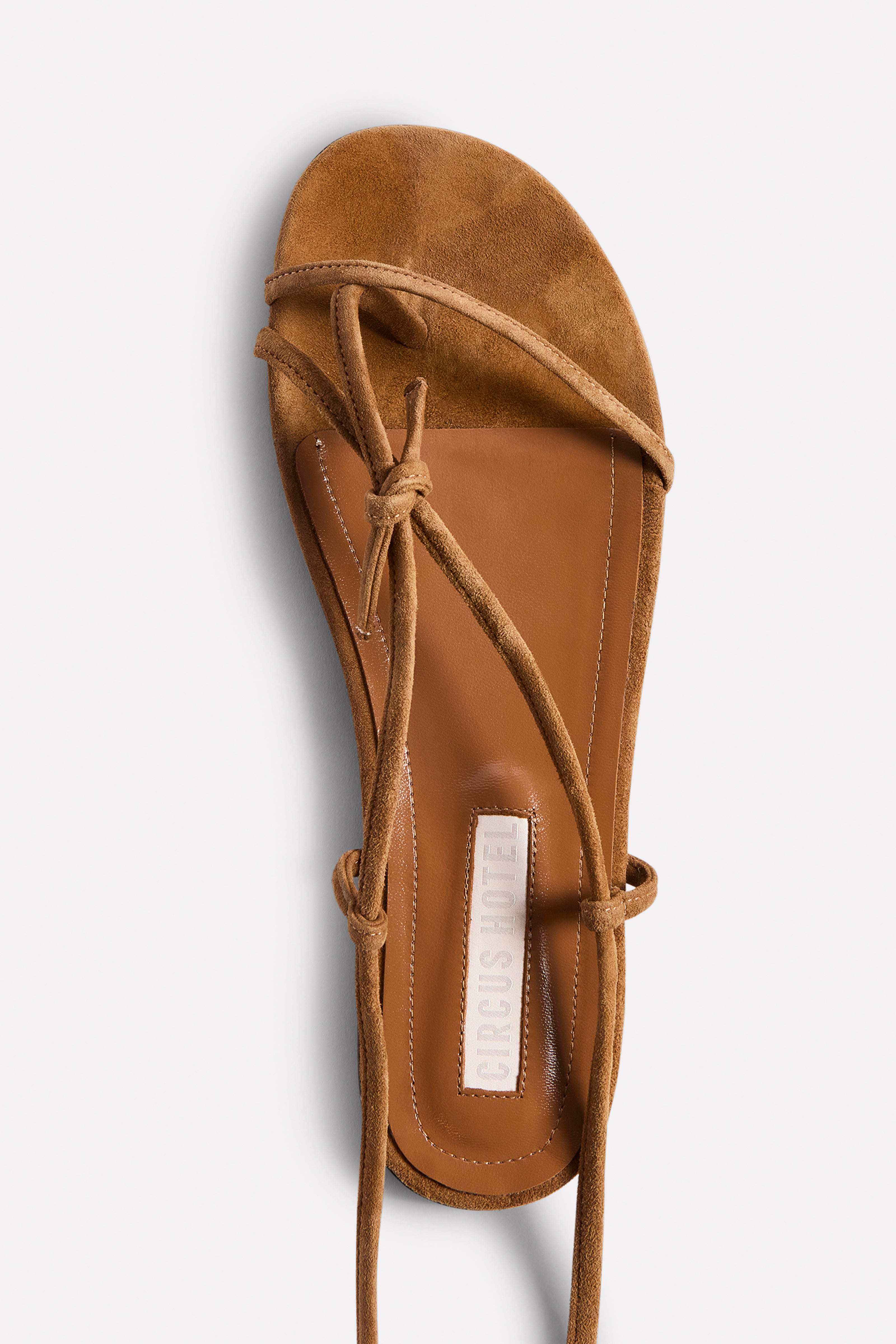 SANDALO ALLACCIATURA SCHIAVA