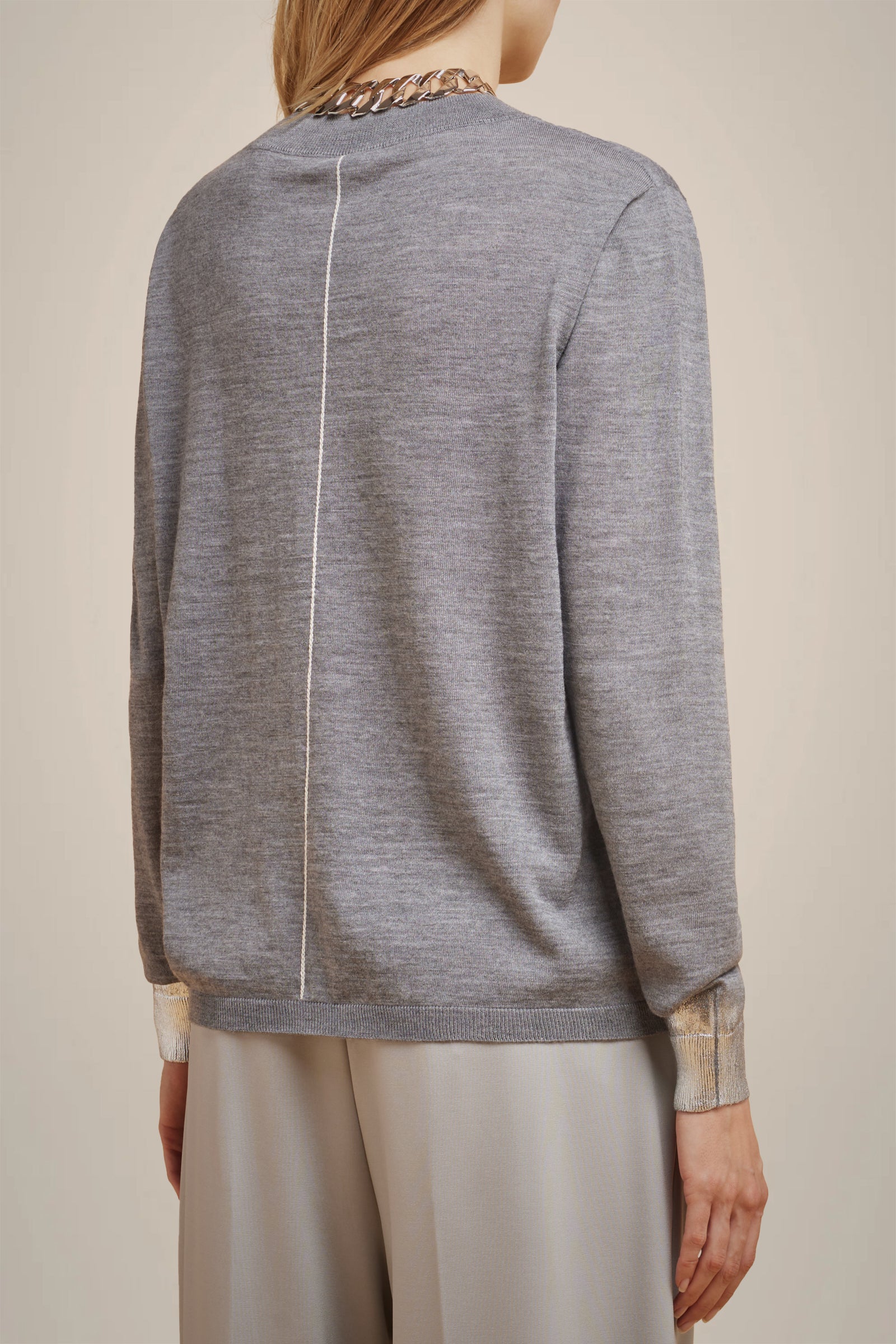 MAGLIA POLSI LAMINATI