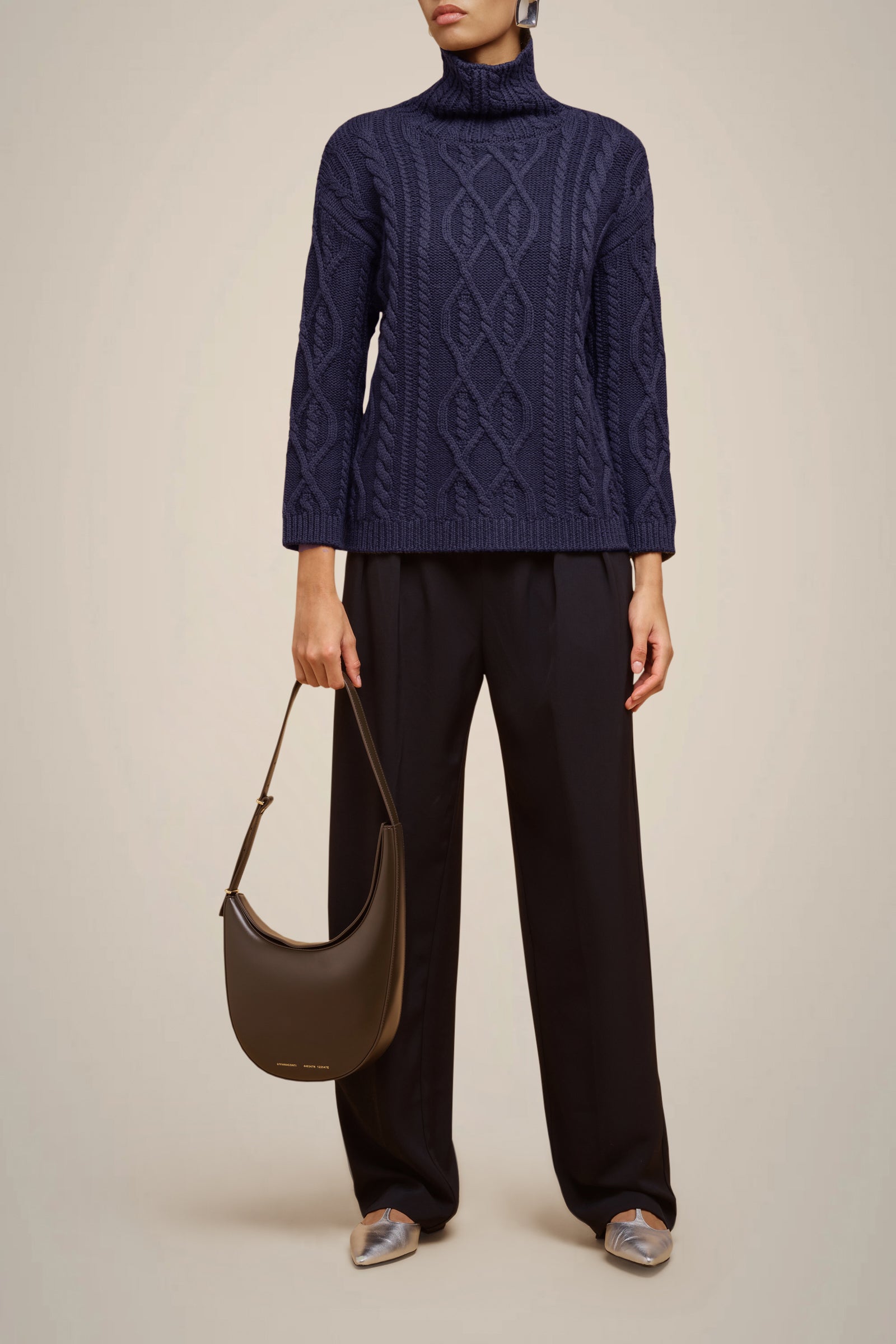 CABLE-KNIT SWEATER