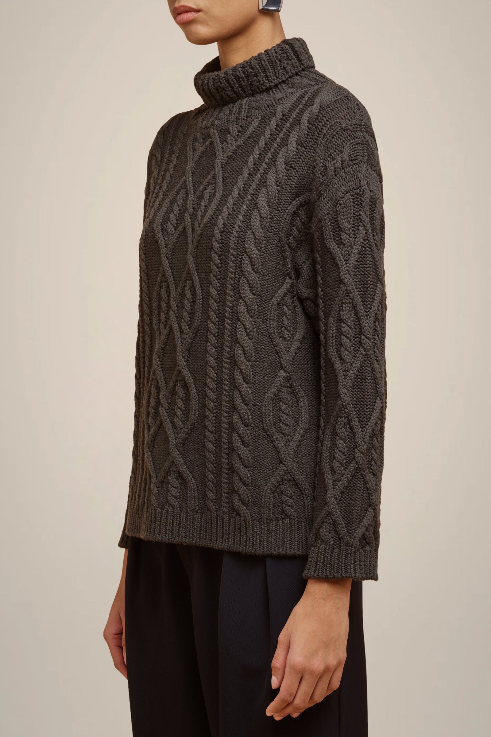 CABLE-KNIT SWEATER