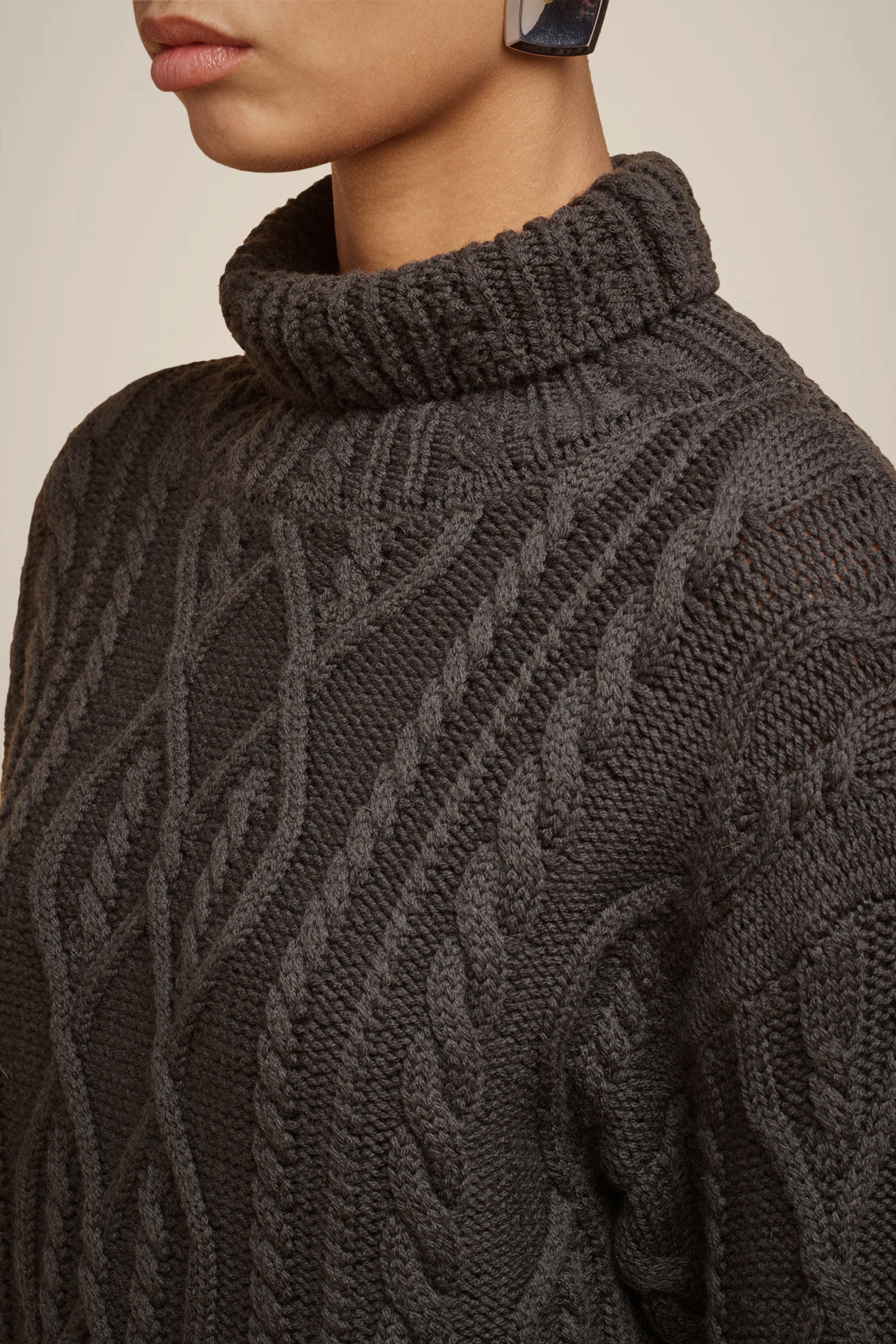 CABLE-KNIT SWEATER