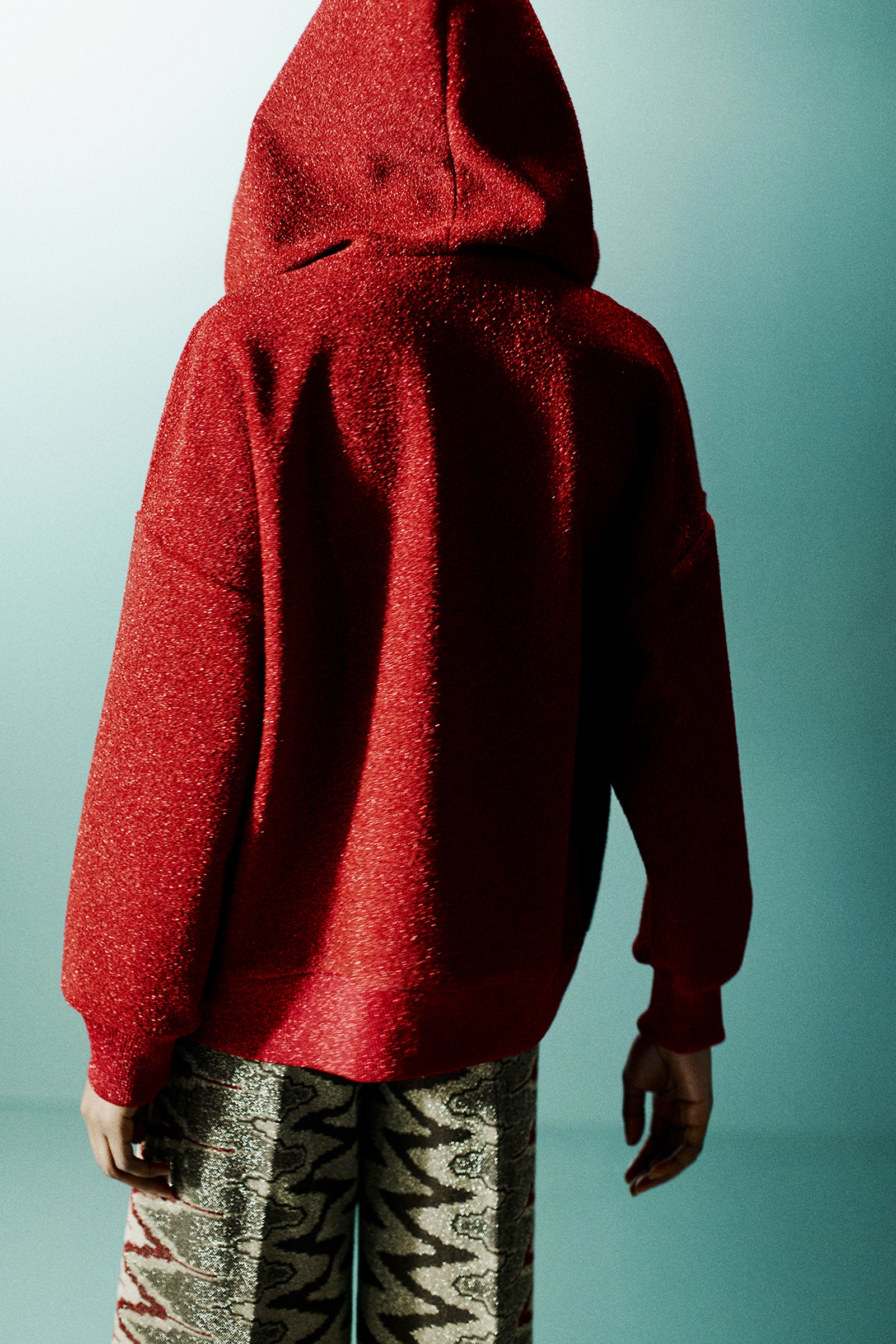 FELPA BOMBER IN LUREX CON CAPPUCCIO